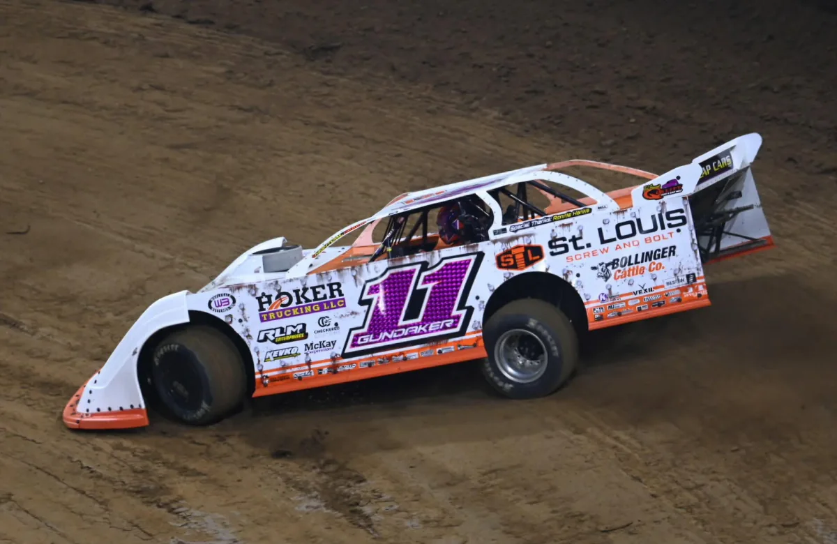Orange and white St. Louis Screw and Bolt sponsored number 11 dirt track race car